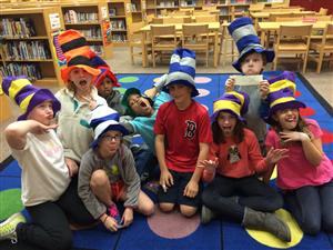 Students wearing seuss hats 